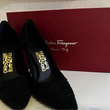 Salvatore Ferragamo black suede high heel pumps.