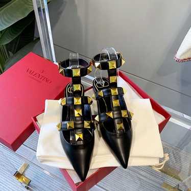 Black Studded Pumps with a Bold Look - image 1