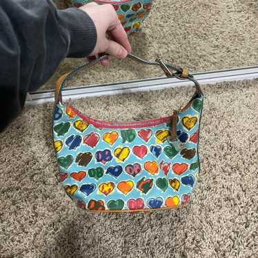 Offers Dooney & Bourke Multi Color Hearts Small Bucket Purse