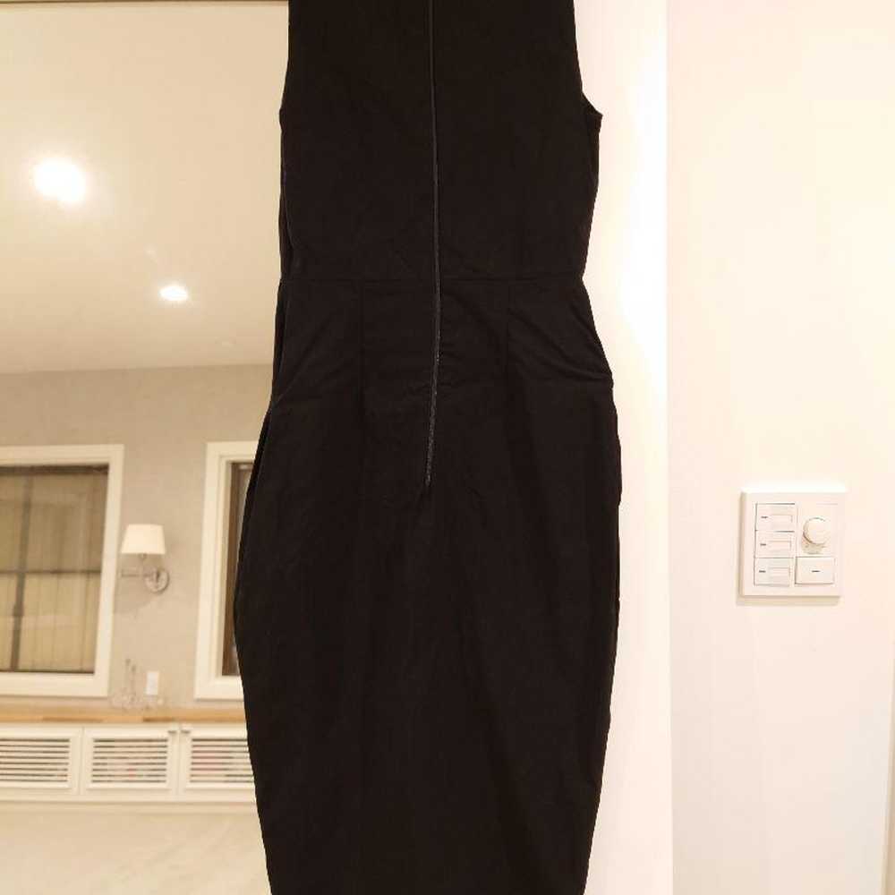 Black sleeveless one-piece dress, knee length wit… - image 3