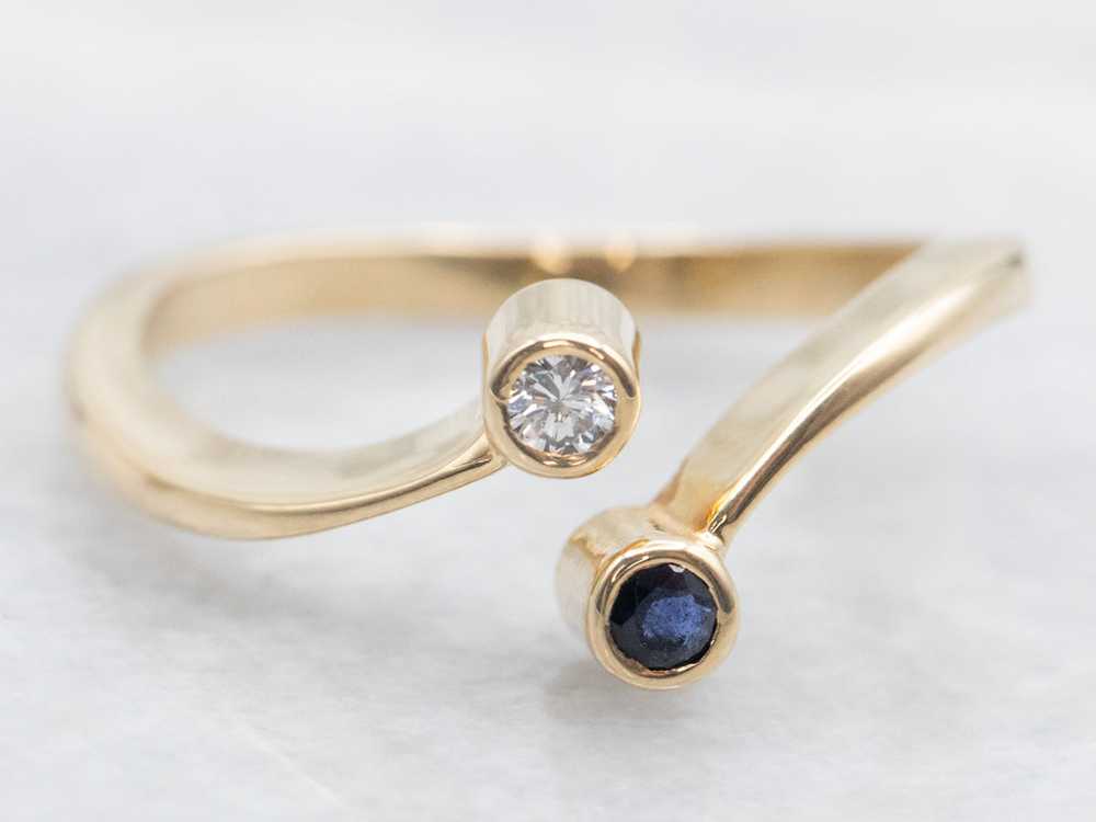 Simple Sapphire and Diamond Bypass Ring - image 1