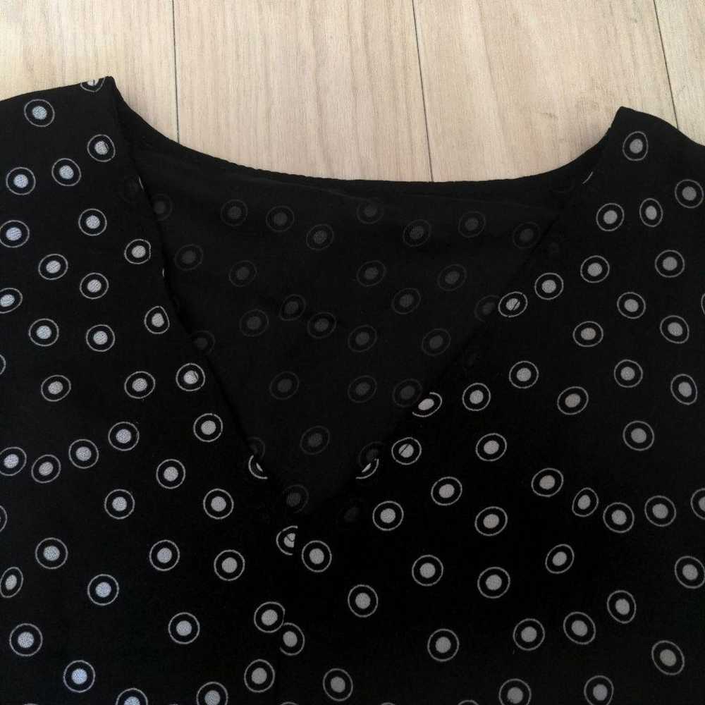 Polka dot pattern black dress. - image 4