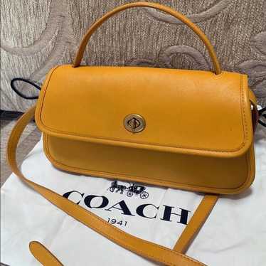 Reissued Vintage Coach 1941 turnlock geometric clu