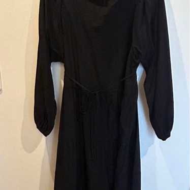 Black long-sleeve dress, size M.