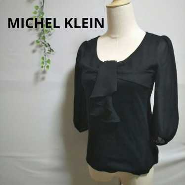 MK Michelle clan blouse with frills on the chest.