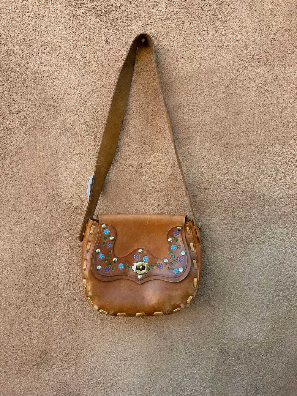 1970's Floral Tooled Brown Leather Saddle Purse - image 1