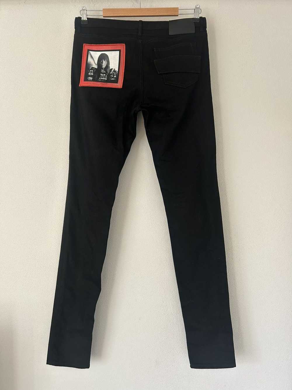 Givenchy Black Slim-Fit Jeans with Red Graphic Pa… - image 1