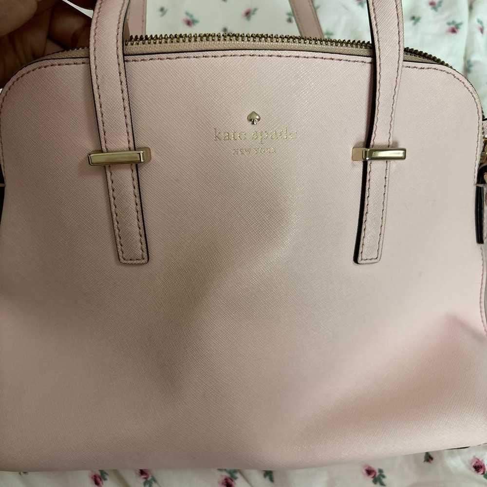 Kate Spade's pastel pink bag. - image 3