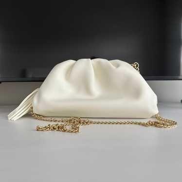 Understated Leather Crescent Clutch