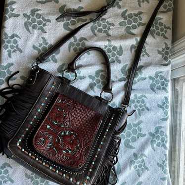 Trinity Ranch women’s brown engraved fringe bag