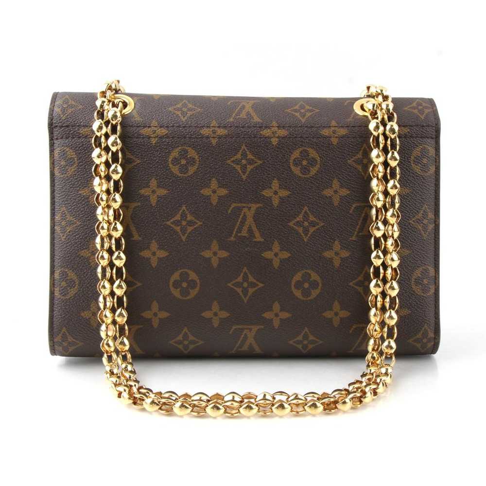 Louis Vuitton Victoire leather handbag - image 2