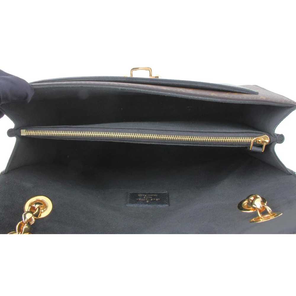 Louis Vuitton Victoire leather handbag - image 7