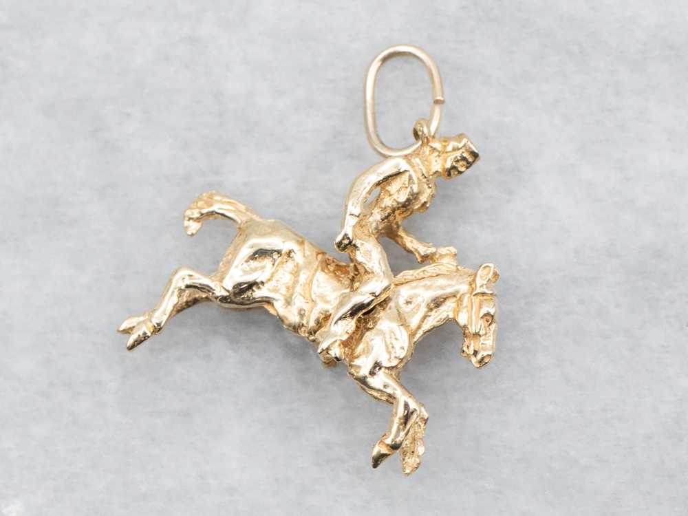 Gold Horse and Rider Pendant - image 1