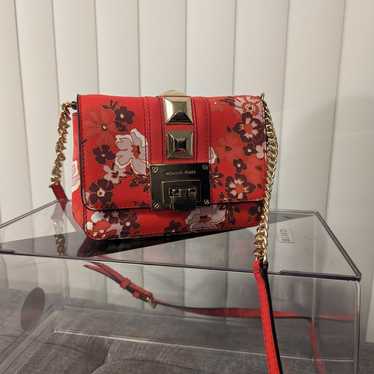 Blood Orange Michael Kors Clutch with Floral desig