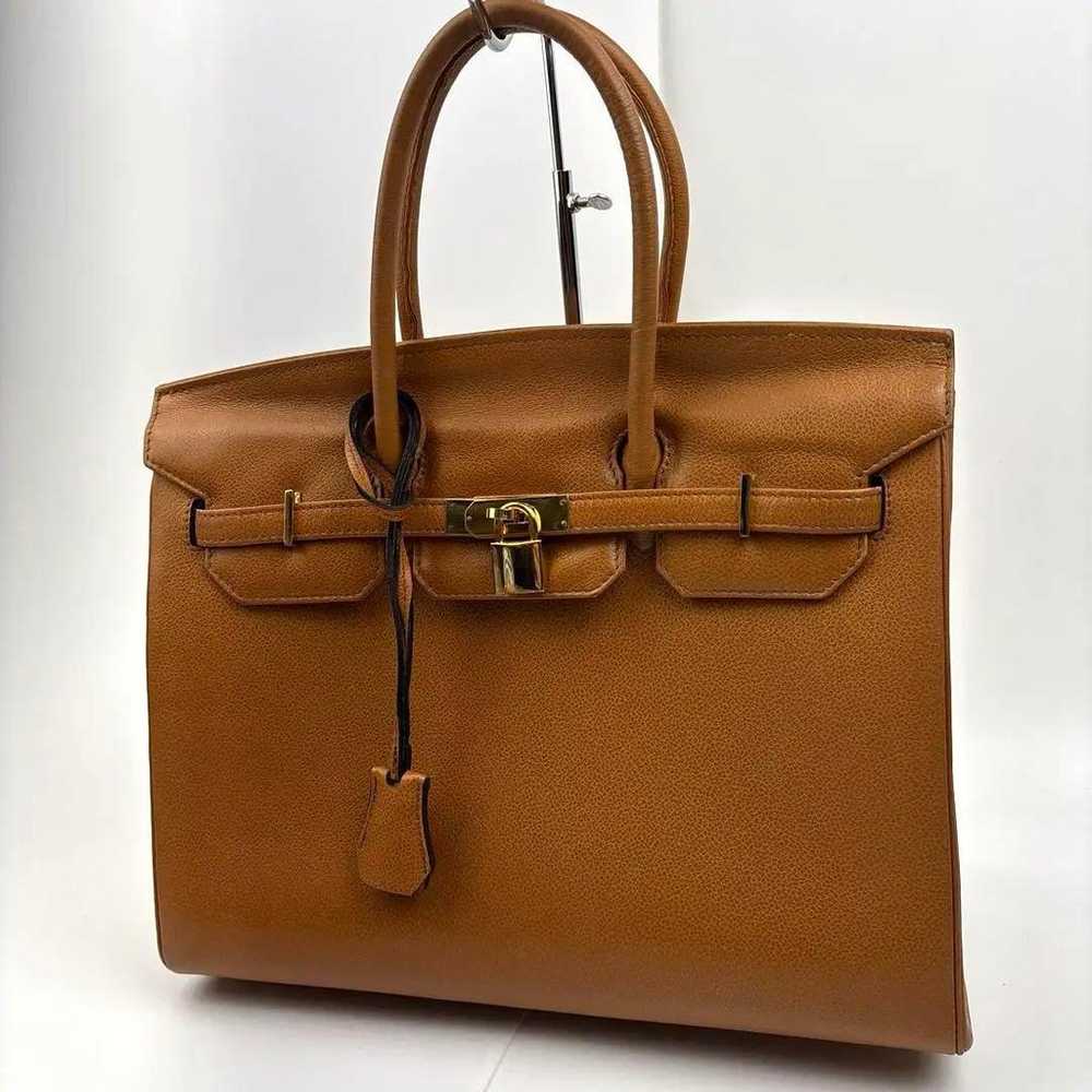 Popular handbag, Cadena, leather, brown, self-sta… - image 1