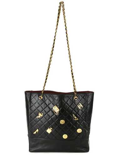 CHANEL Pre-Owned metallic icon charms tote - Black