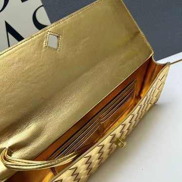 Woven leather clutch bag