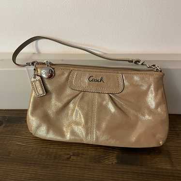 Coach wristlet champagne shimmer metallic gold