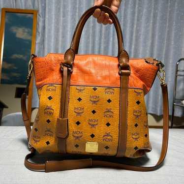 MCM Shoulder Bag in Orange and Brown.