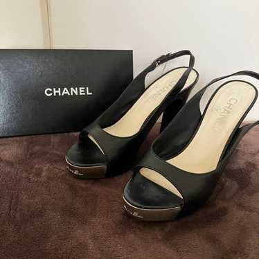 Chanel high-heeled pumps with leather and logo, si