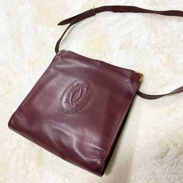 Cartier clutch leather shoulder bag.