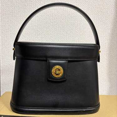 Valentino Garavani black leather handbag.