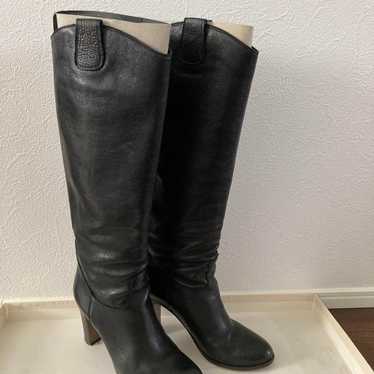 Long boots black genuine leather.