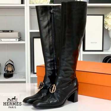 Hermes leather long boots in black.