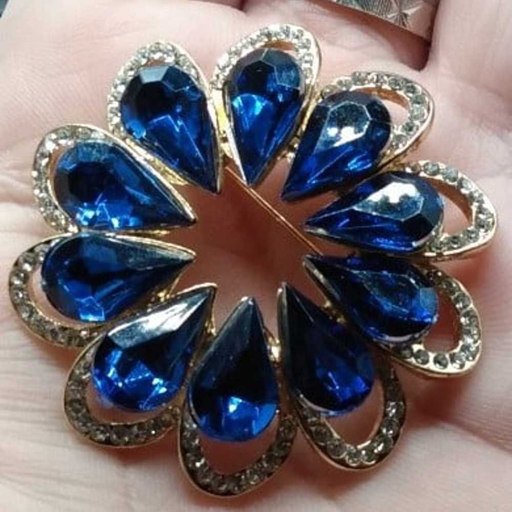 Dark blue multi teardop rhinestone flower brooch - image 1