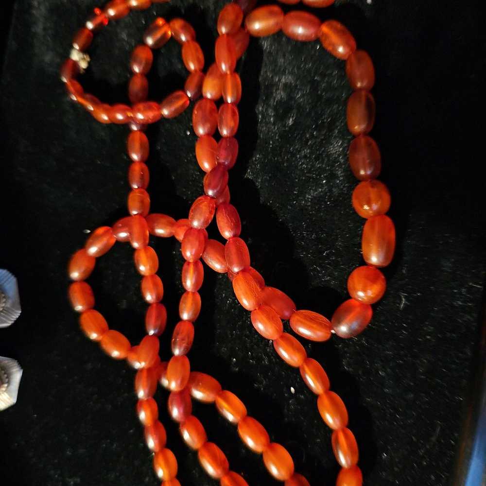 Necklace BEADS,BROWNISH ORANGE, EITHER AMBER OR C… - image 1