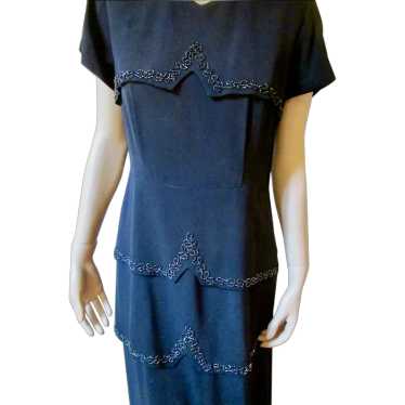 Multi-tiered beaded black dress, "A Martha Adams f