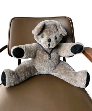 Teddy bear with leather dagger necklace