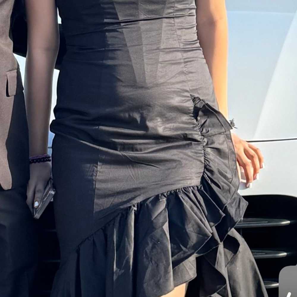 black dress with ruffles - image 2