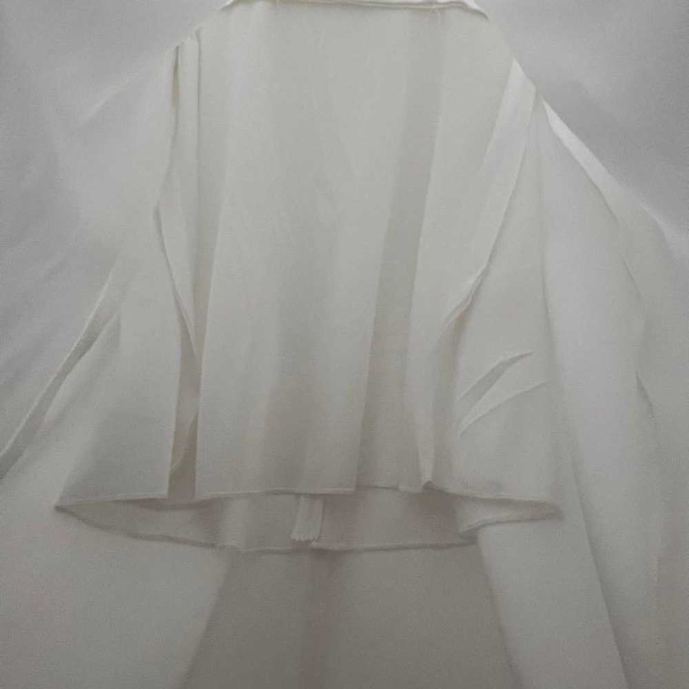 White long-sleeved long dress wedding dress. - image 7