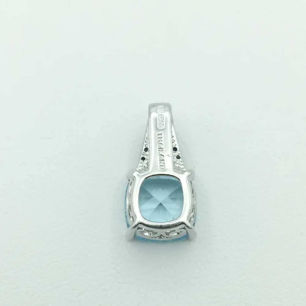 Sterling Silver .08ctw Topaz and Diamond Pendant - image 2