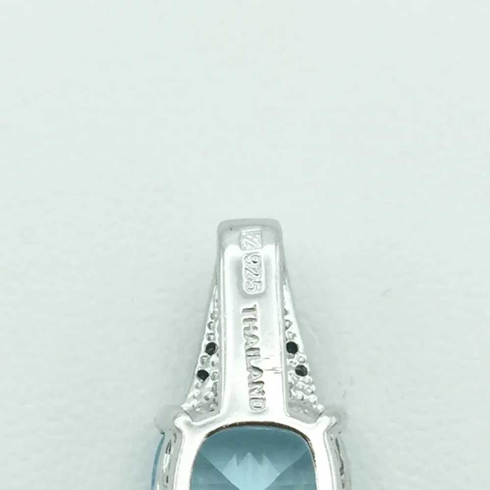 Sterling Silver .08ctw Topaz and Diamond Pendant - image 3