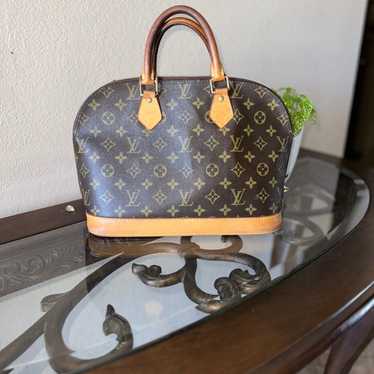 Louis Vuitton Alma Handbag