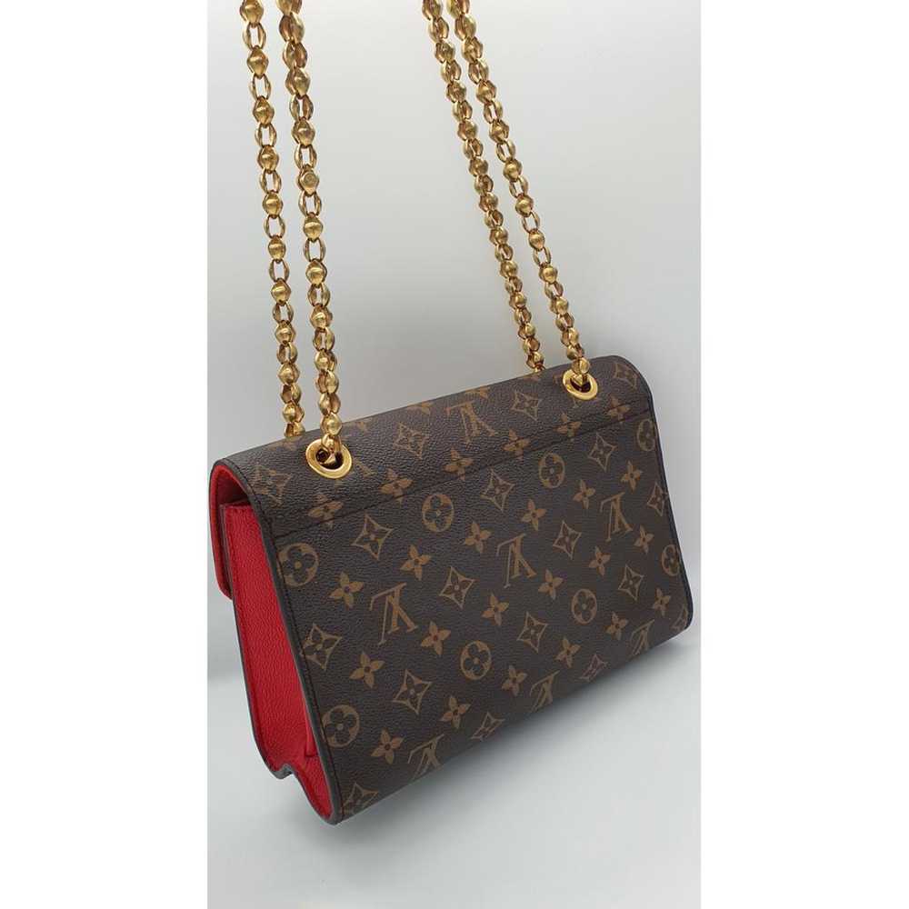 Louis Vuitton Victoire cloth handbag - image 4