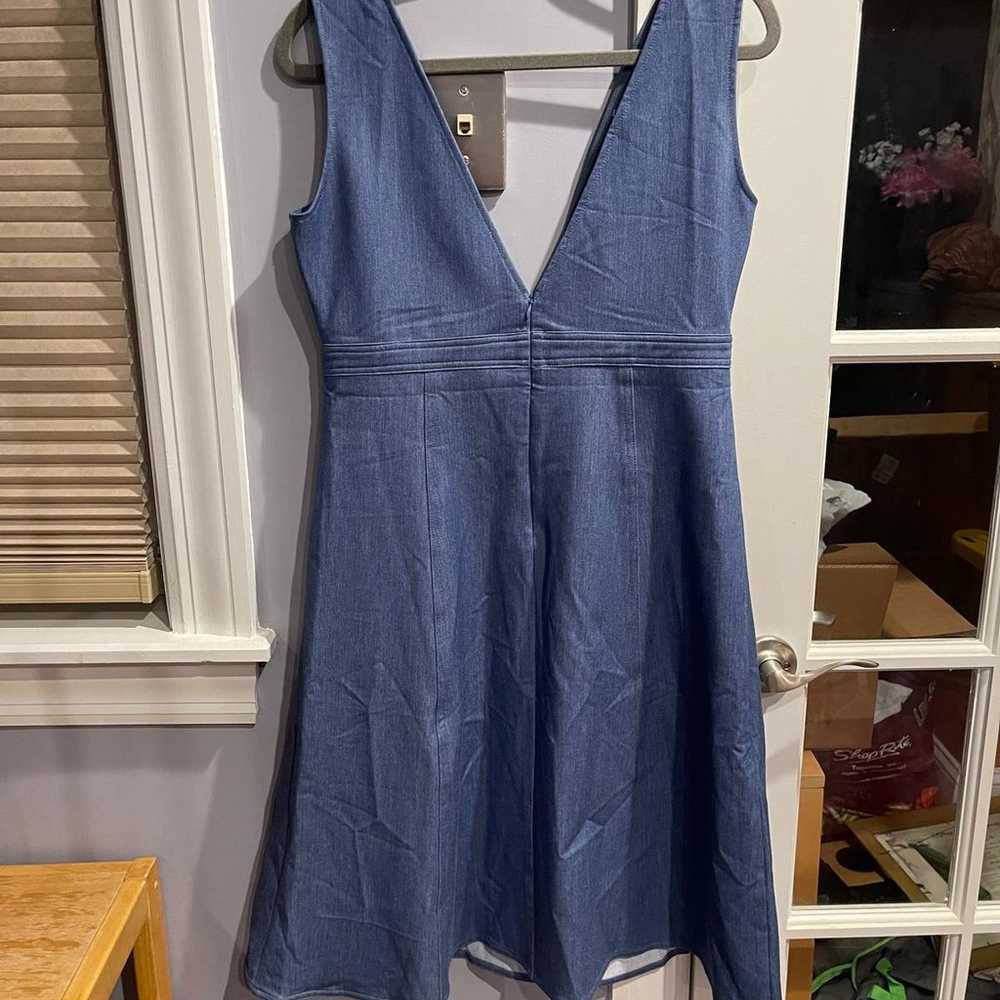 Denim pinafore dress with pockets - image 6