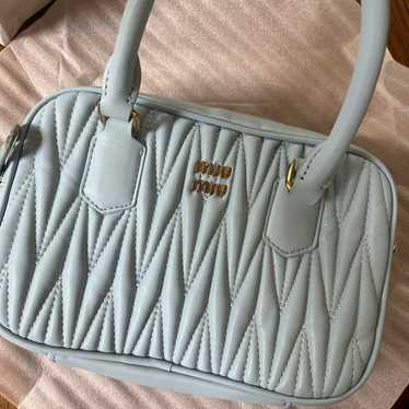 miumiu style handbags are cute.