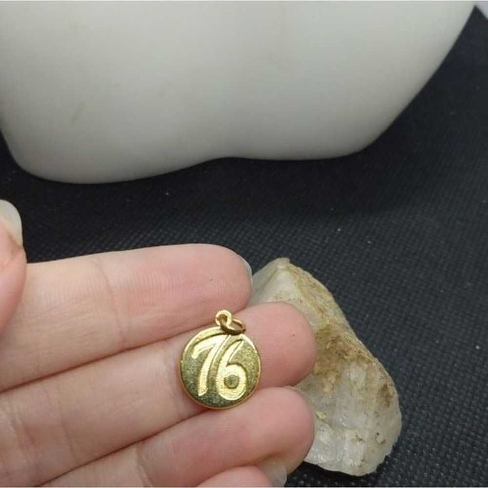 76 number gold necklace pendant - image 1