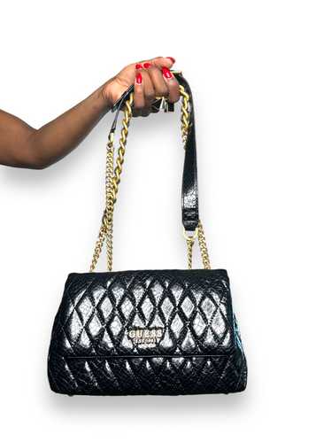 Trend: “Guess” Black and Gold Embossed Leather Sho