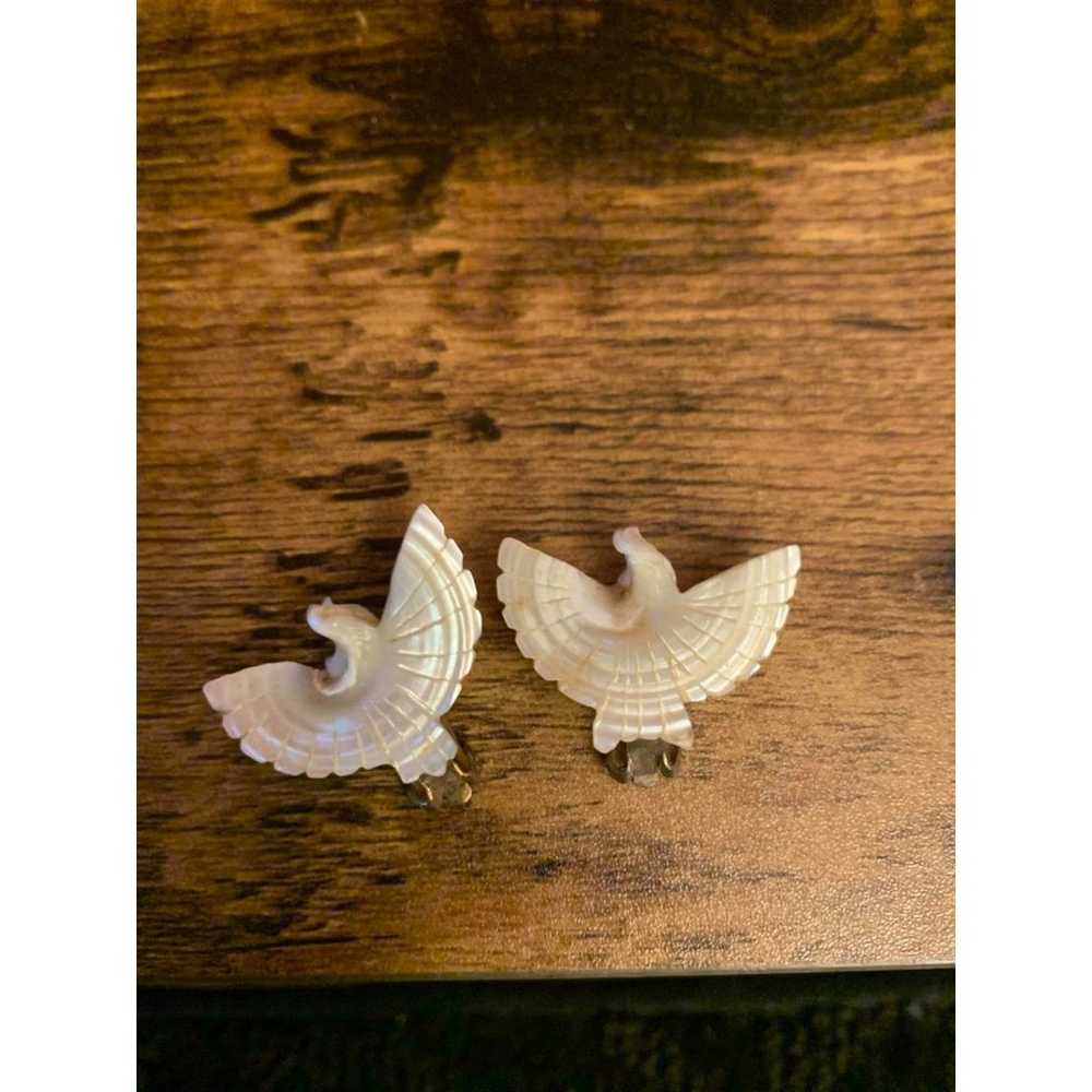 Vintage Mother of Pearl Hand Carved Dove Peace Ea… - image 1