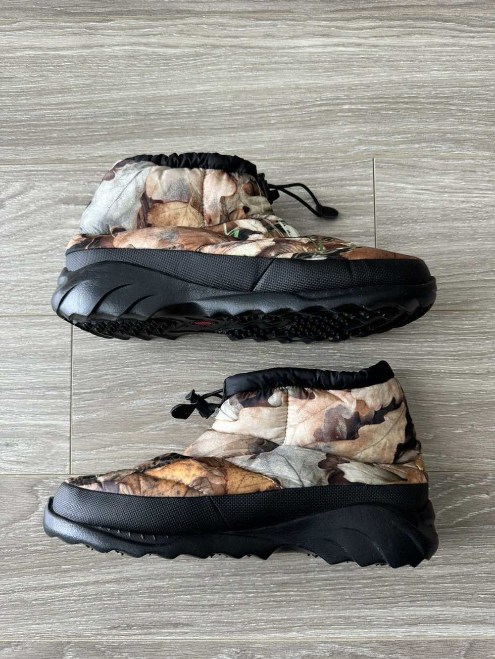 Supreme × The North Face Leaf Camo Nuptse Boot, S… - image 1