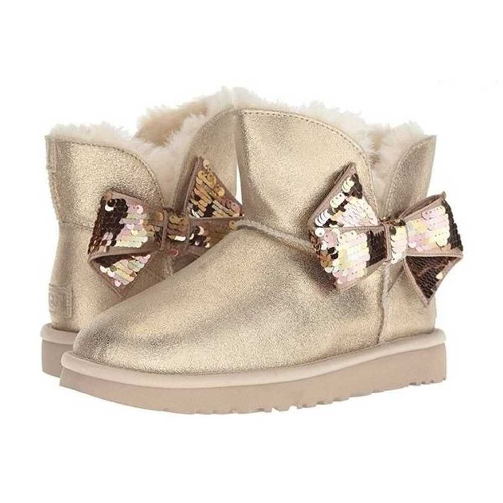 UGG WOMEN'S MINI SEQUIN BOW BOOTS GOLD - image 1