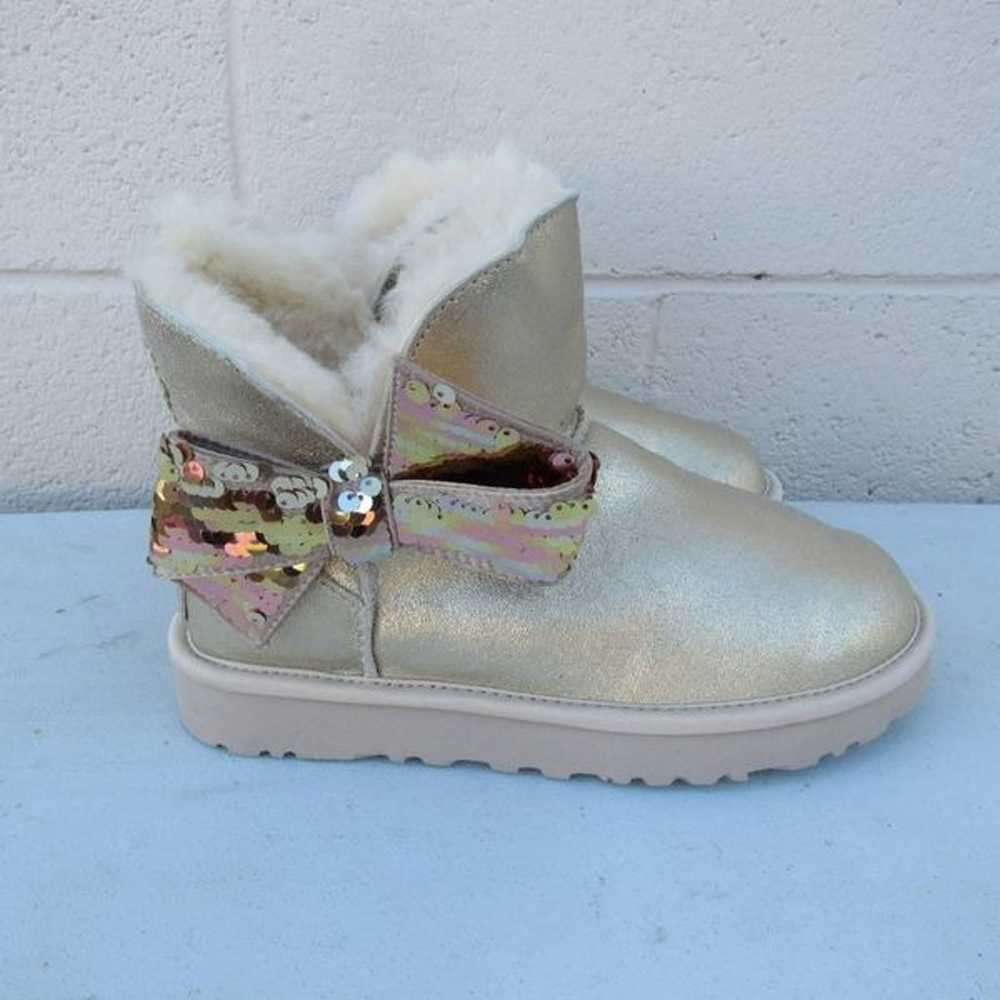 UGG WOMEN'S MINI SEQUIN BOW BOOTS GOLD - image 2