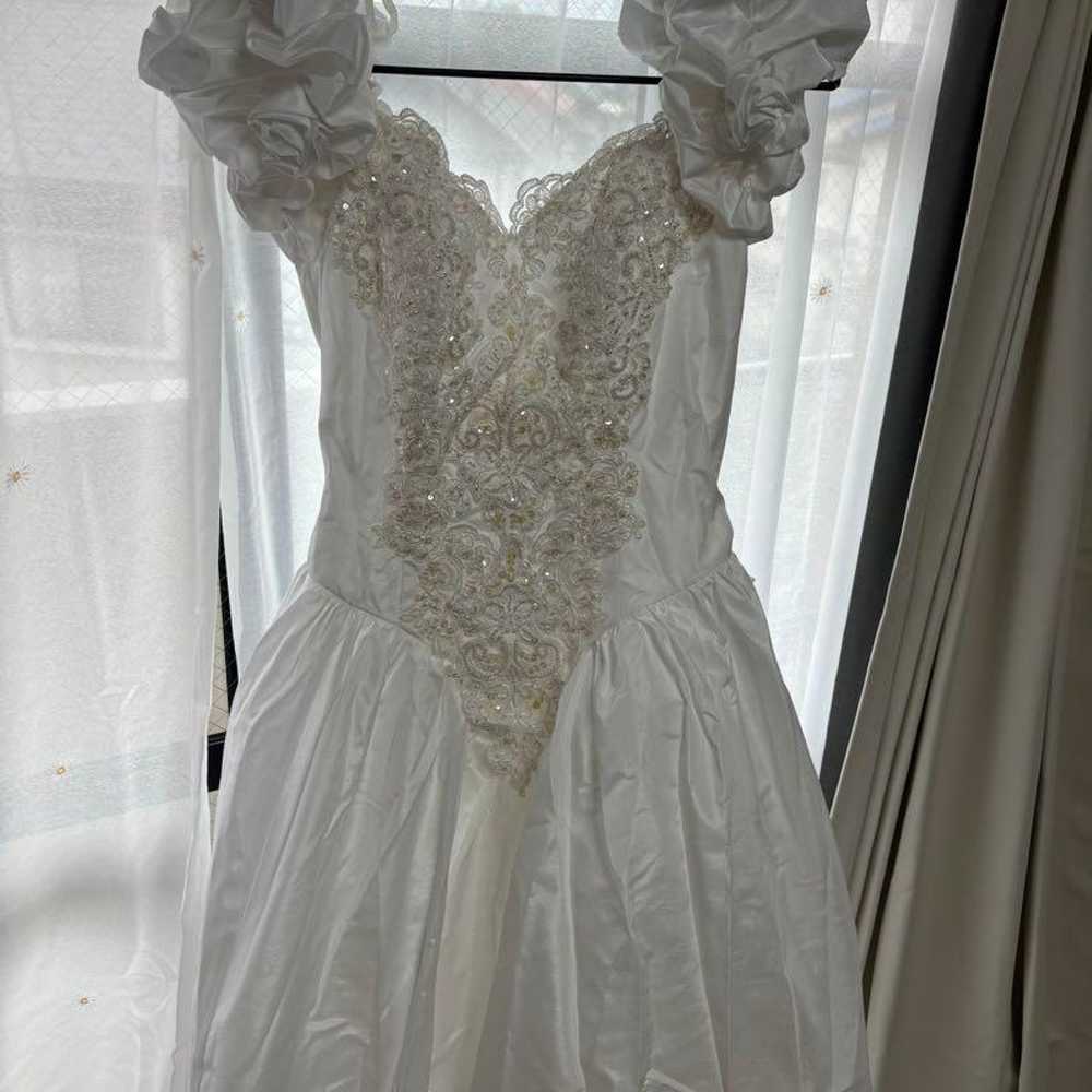 Wedding dress, tall size, second-hand item. - image 1