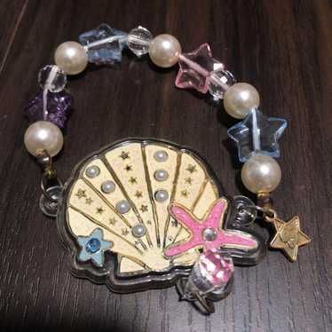 Old swimmer, old swimmer, bracelet, seashell, she… - image 1