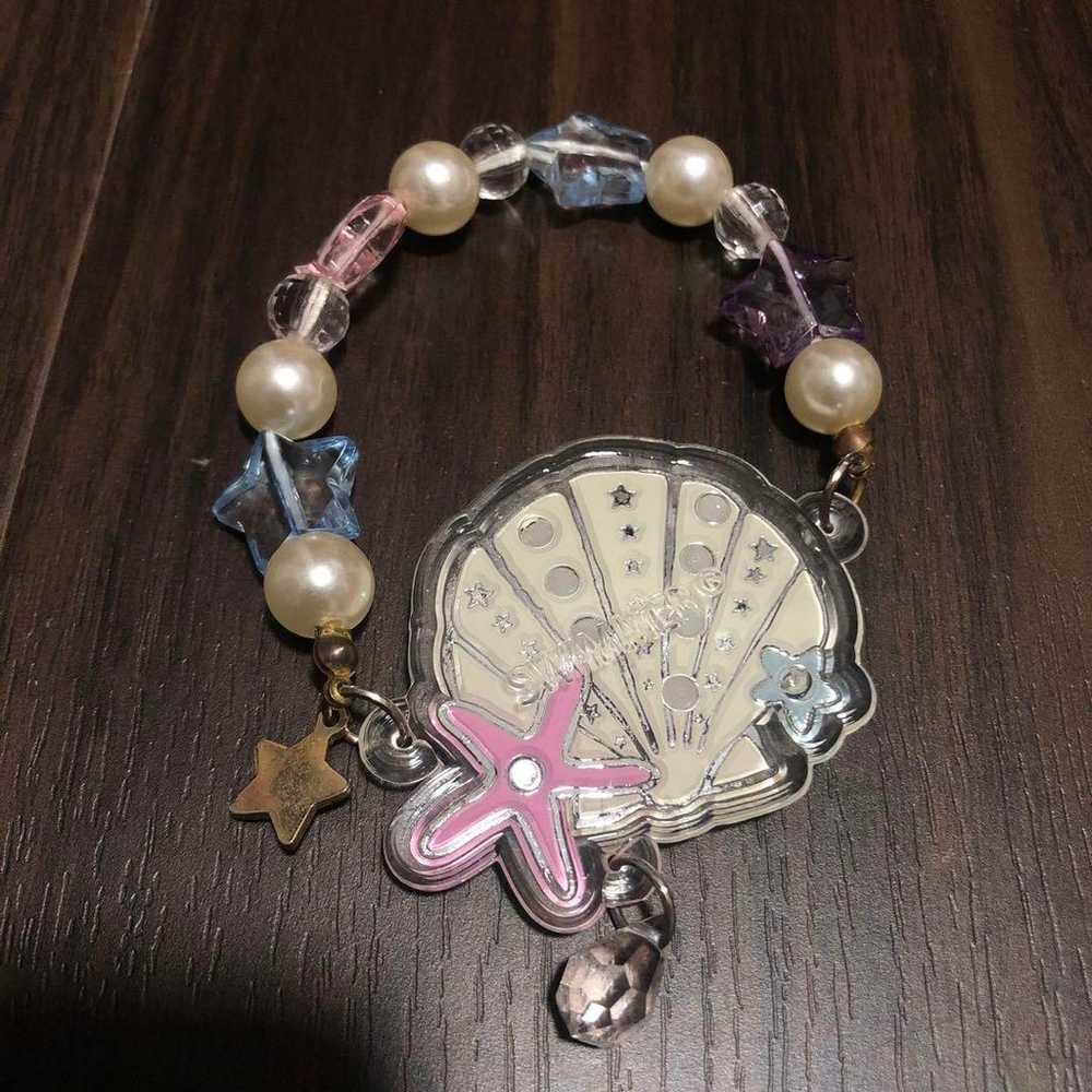 Old swimmer, old swimmer, bracelet, seashell, she… - image 2