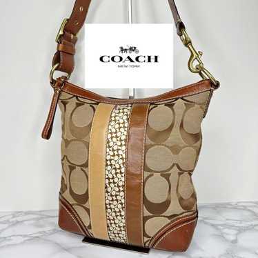 23 COACH Signature Shoulder Bag